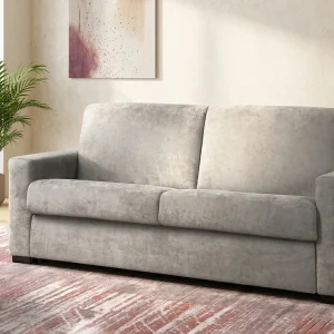 Divano letto Beatrice con rete elettrosaldata in un luminoso soggiorno moderno